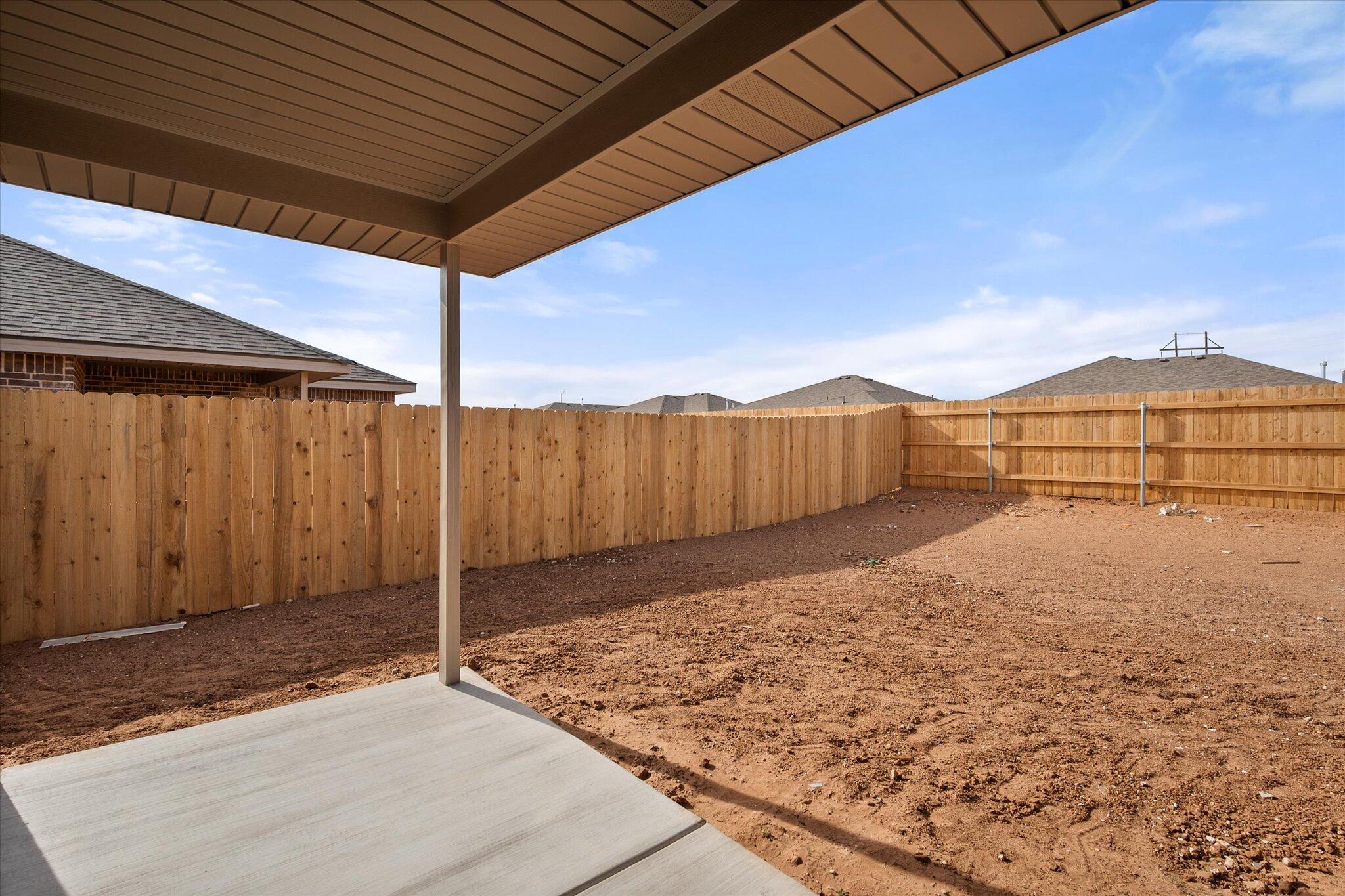6308 Virginia Avenue Lubbock, TX 79407 - Photo 19 of 20 a view of a backyard
