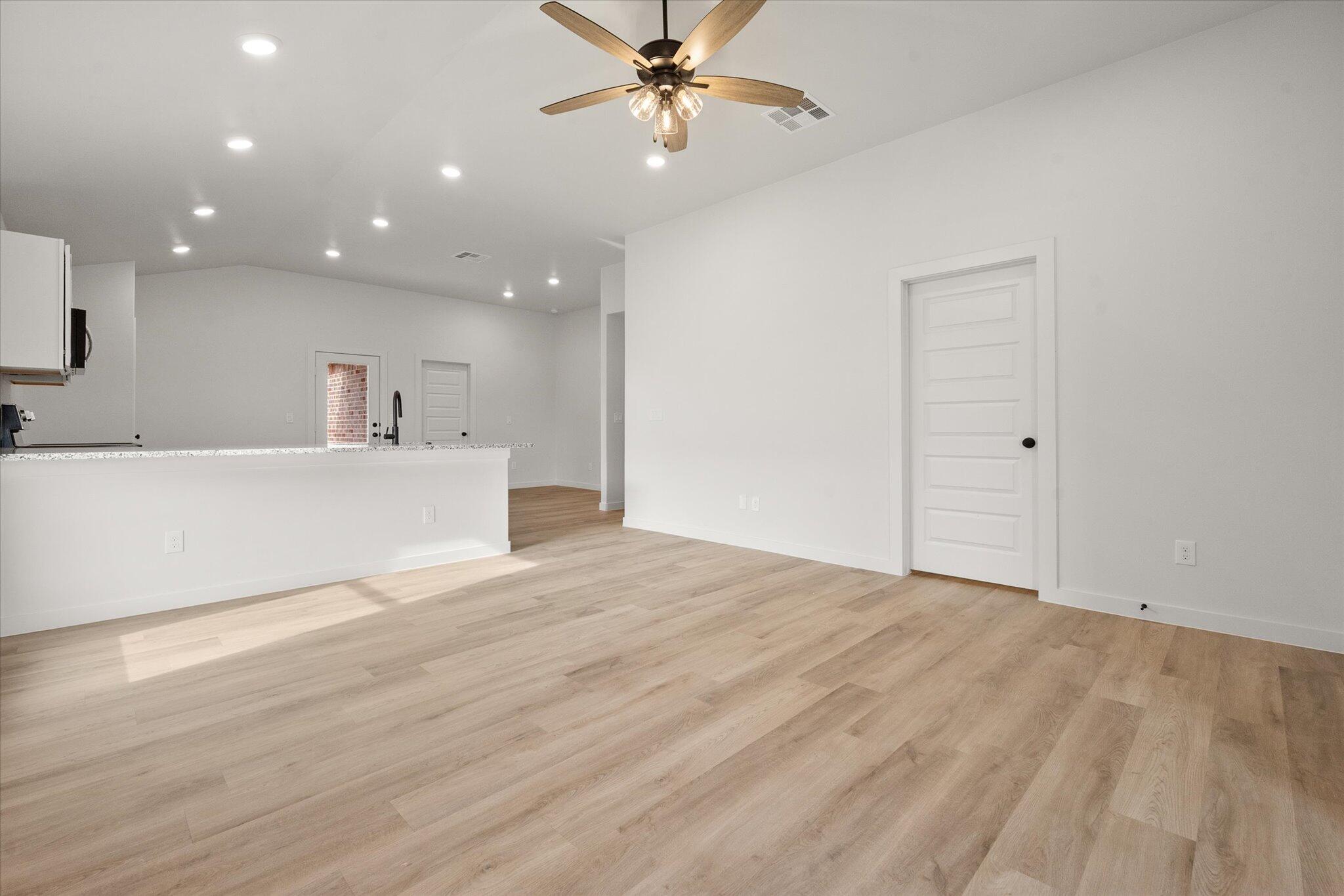 6308 Virginia Avenue Lubbock, TX 79407 - Photo 4 of 20 a view of an empty room with a window