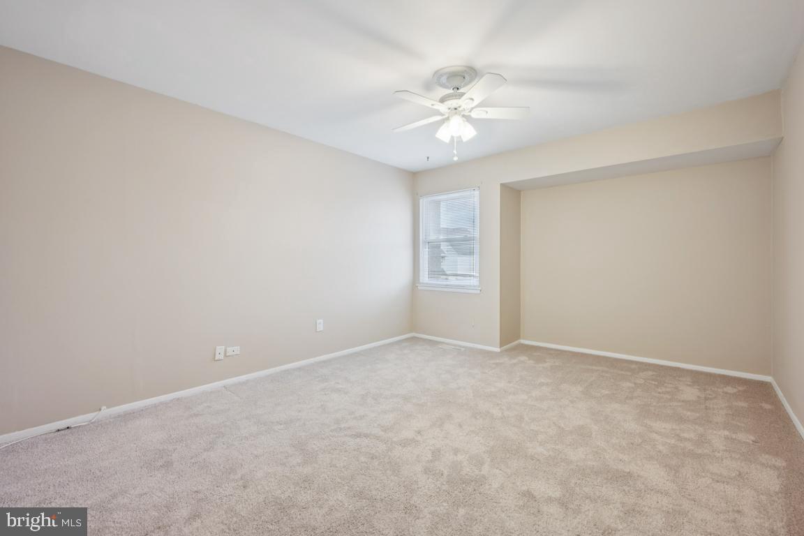 8 Tulip Court Mount Laurel, NJ 08054 - Photo 19 of 23 an empty room with windows and fan