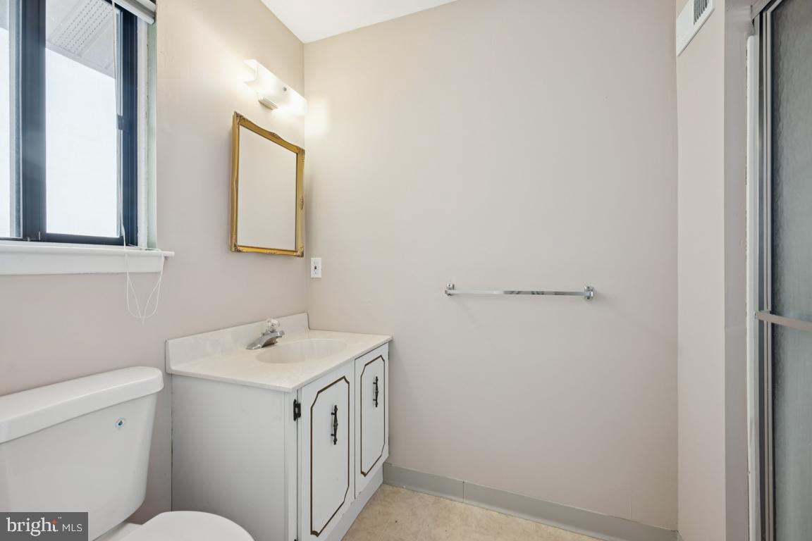 8 Tulip Court Mount Laurel, NJ 08054 - Photo 20 of 23 a view of bathroom with a sink toilet and a mirror