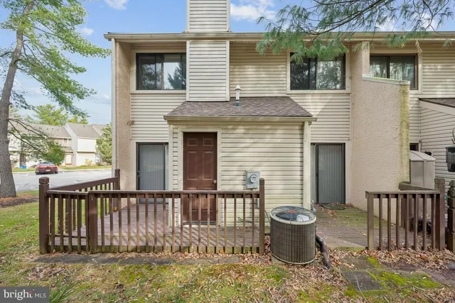 a front view of house with patio