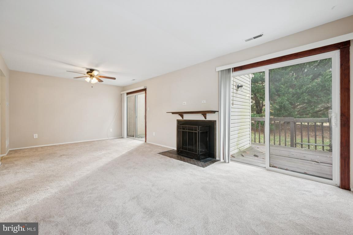 8 Tulip Court Mount Laurel, NJ 08054 - Photo 4 of 23 a view of a livingroom with an empty space and a fireplace