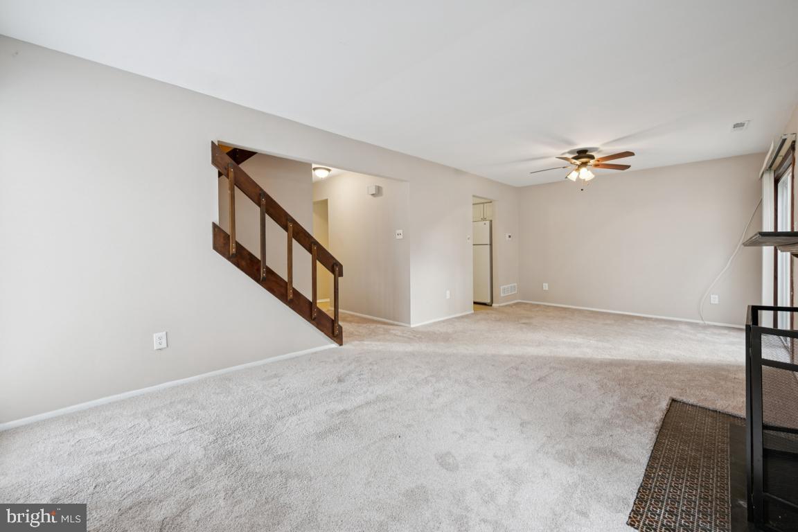 8 Tulip Court Mount Laurel, NJ 08054 - Photo 6 of 23 a view of an empty room with a ceiling fan