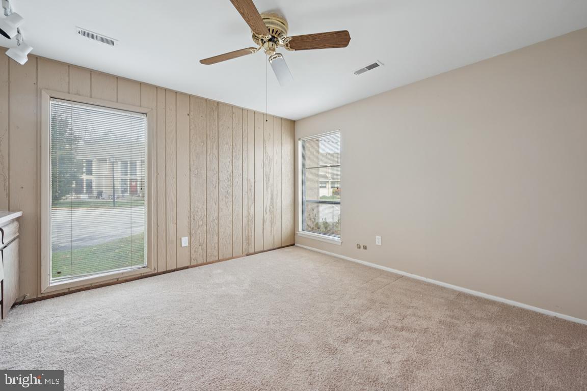 8 Tulip Court Mount Laurel, NJ 08054 - Photo 8 of 23 an empty room with windows and fan