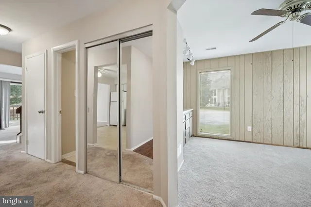 a view of a bathroom with a glass shower door