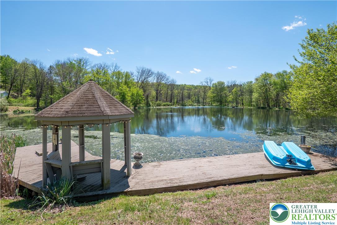 1072 5 Points Richmond Road Bangor, PA 18013 - Photo 8 of 66 a view of a lake with a house in the background