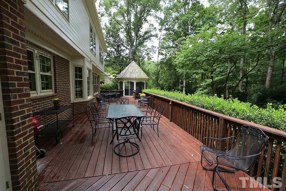 14408 Possum Track Road Raleigh, NC 27614 - Photo 22 of 25 Deck is over 50 feet long, great for entertaining.