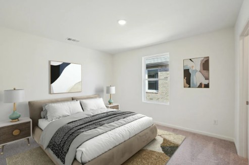 16041 Cowslip Way Austin, TX 78725 - Photo 19 of 26 a bedroom with a bed and a window