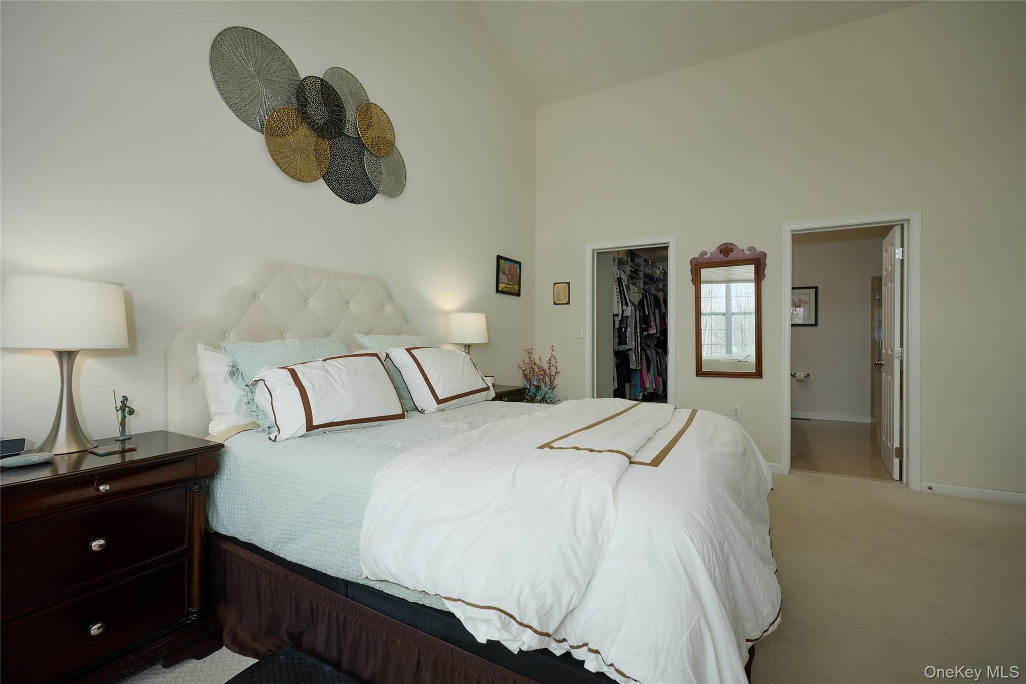 40 Evan Court Fishkill, NY 12508 - Photo 18 of 49 a bedroom with a bed and a lamp