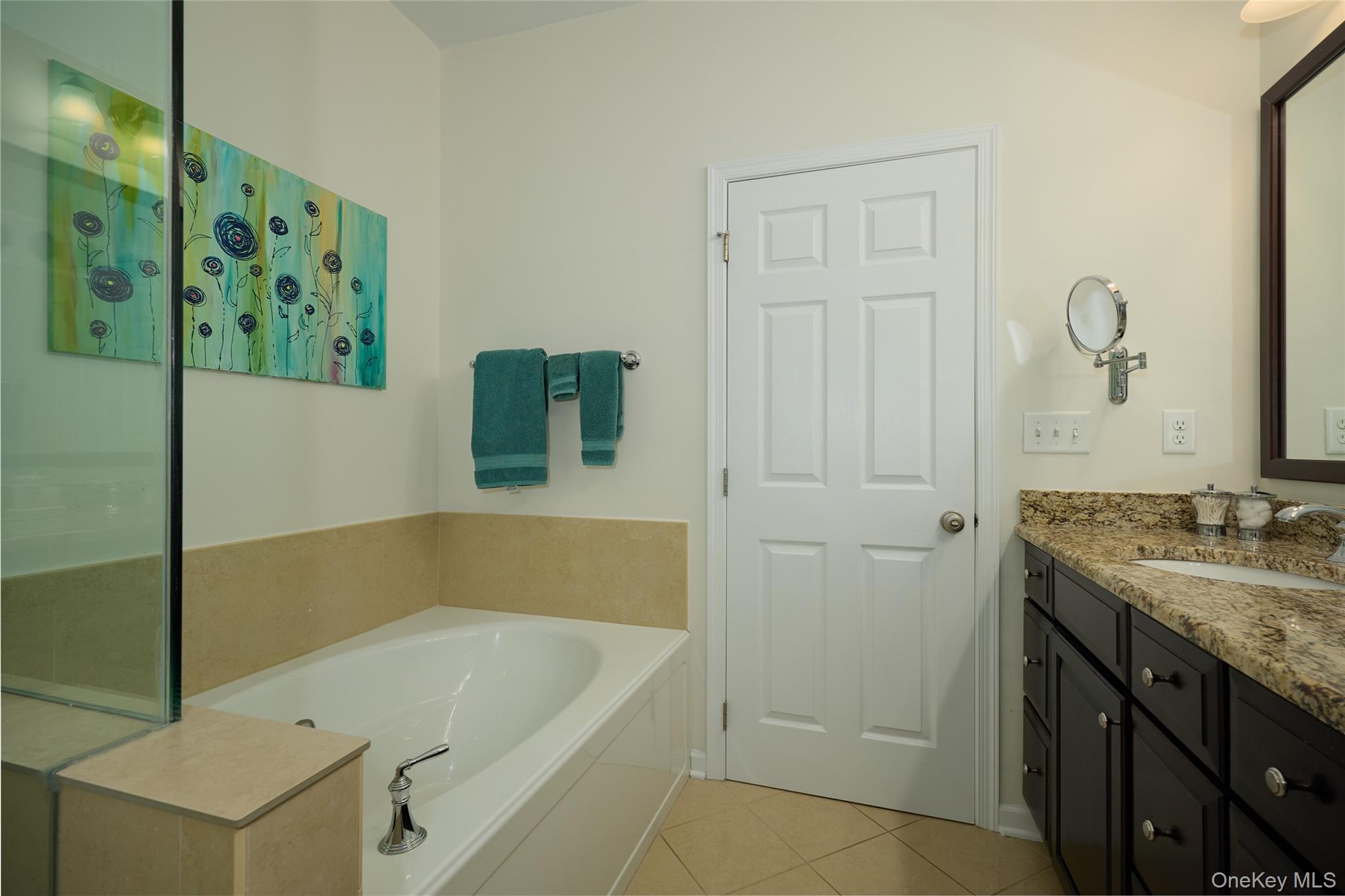 40 Evan Court Fishkill, NY 12508 - Photo 21 of 49 a bathroom with a tub sink and vanity