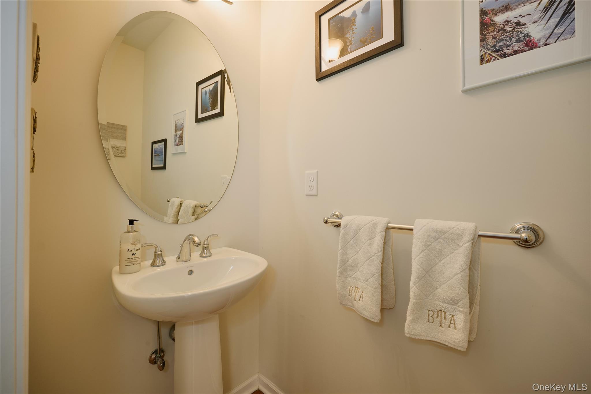 40 Evan Court Fishkill, NY 12508 - Photo 24 of 49 a bathroom with a sink and mirror
