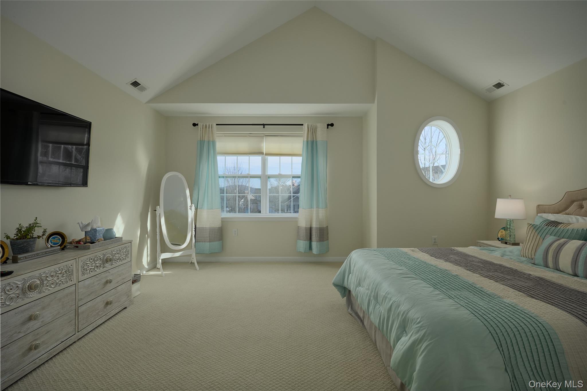 40 Evan Court Fishkill, NY 12508 - Photo 28 of 49 a bedroom with a bed and a large window