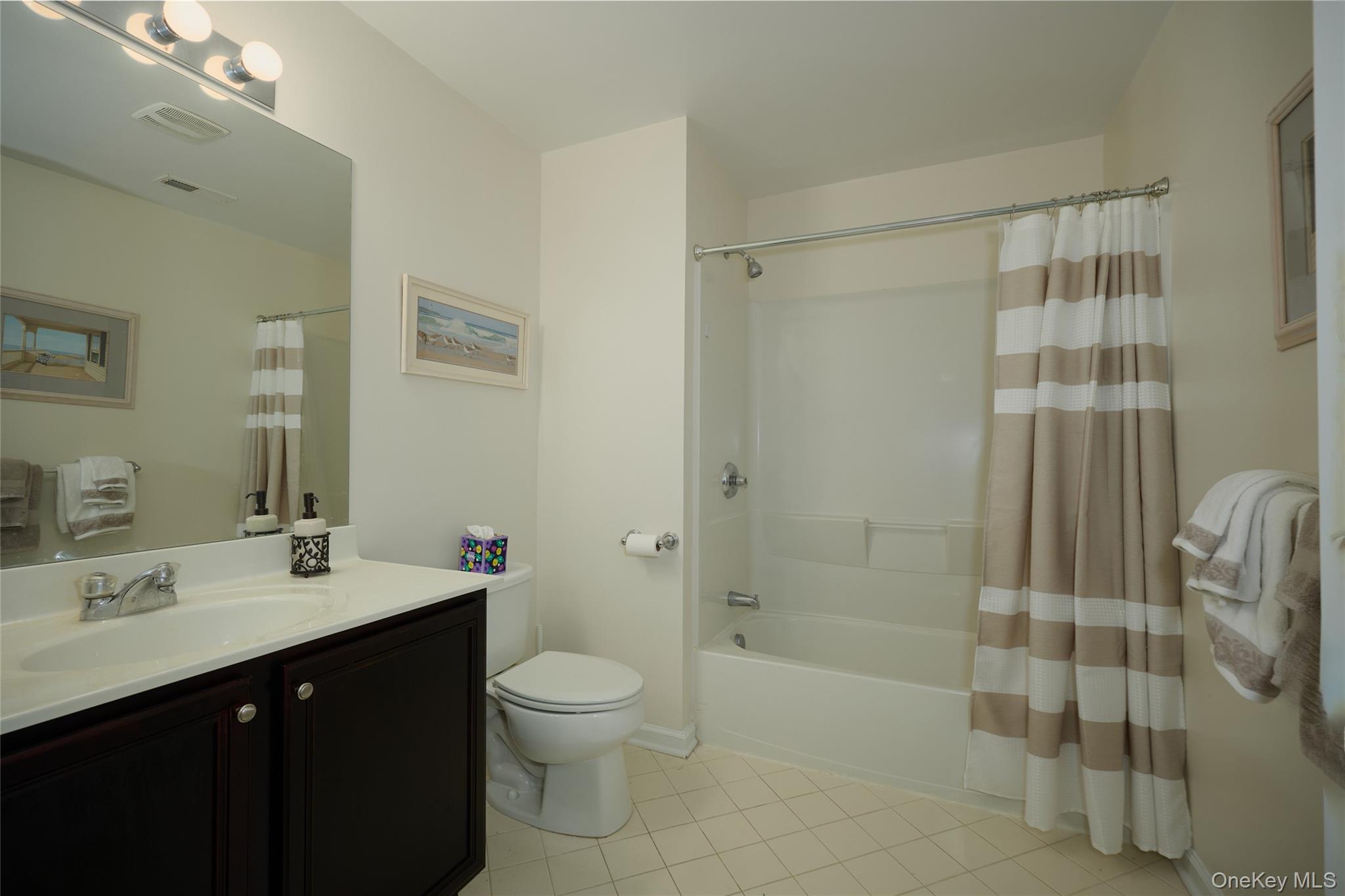 40 Evan Court Fishkill, NY 12508 - Photo 31 of 49 a bathroom with a sink a toilet and shower