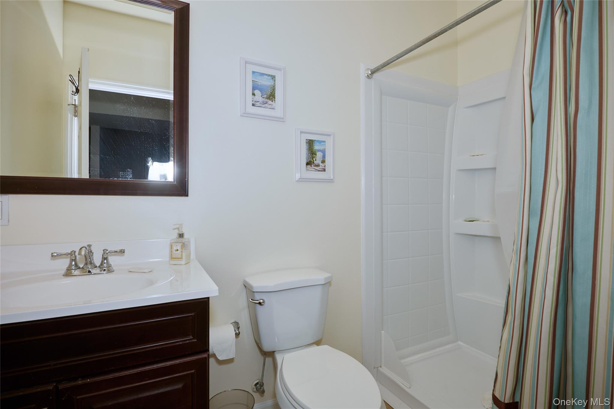 40 Evan Court Fishkill, NY 12508 - Photo 35 of 49 a bathroom with a sink a toilet and shower