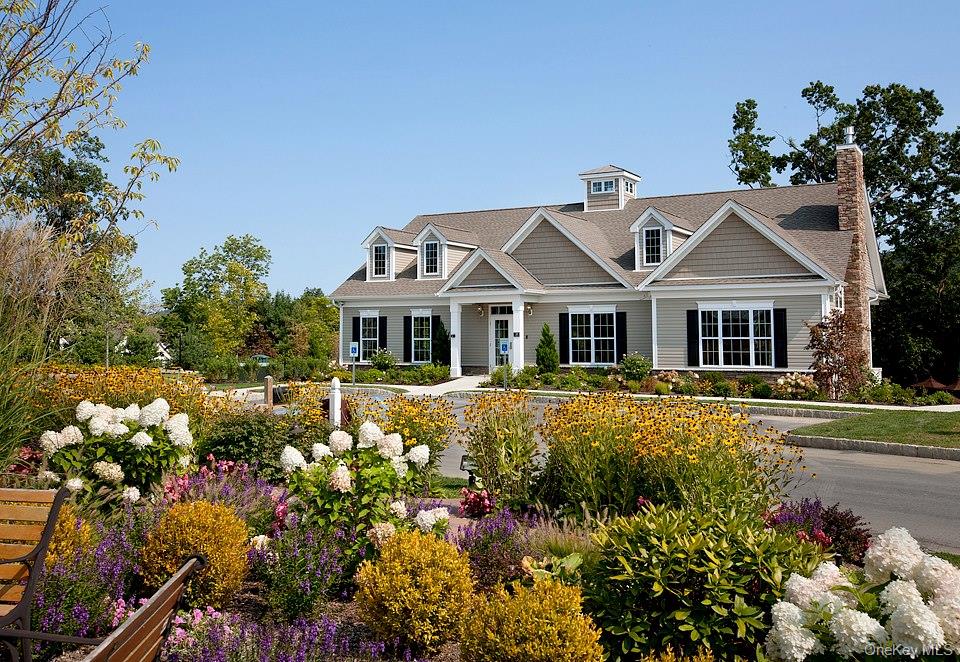 40 Evan Court Fishkill, NY 12508 - Photo 46 of 49 a front view of a house with a yard and fountain