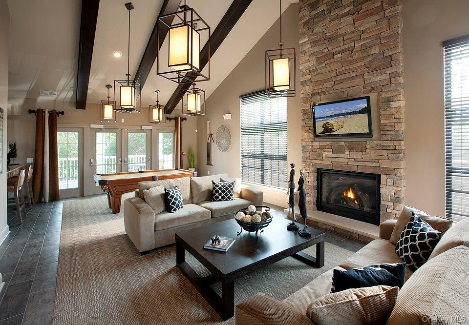 40 Evan Court Fishkill, NY 12508 - Photo 47 of 49 a living room with furniture fireplace and a large window