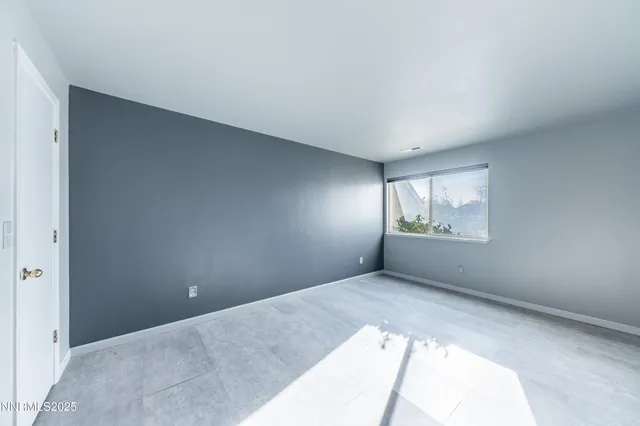 a bathroom with a sink a mirror and a toilet