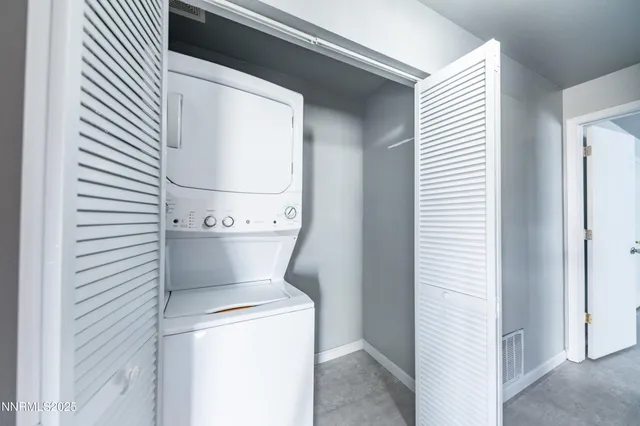 a view of a two chair in the balcony