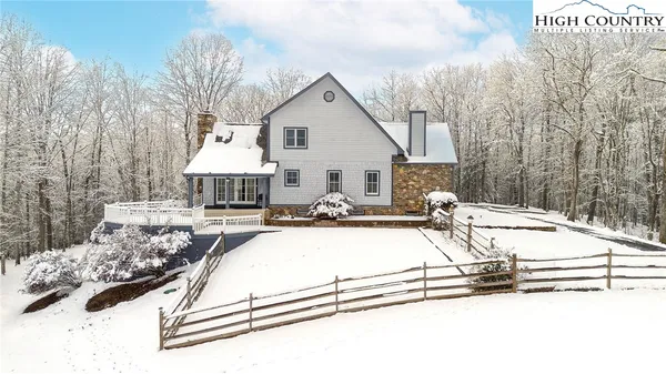 a view of a dinning table and chairs in the house