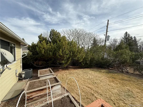 an empty room with closet area