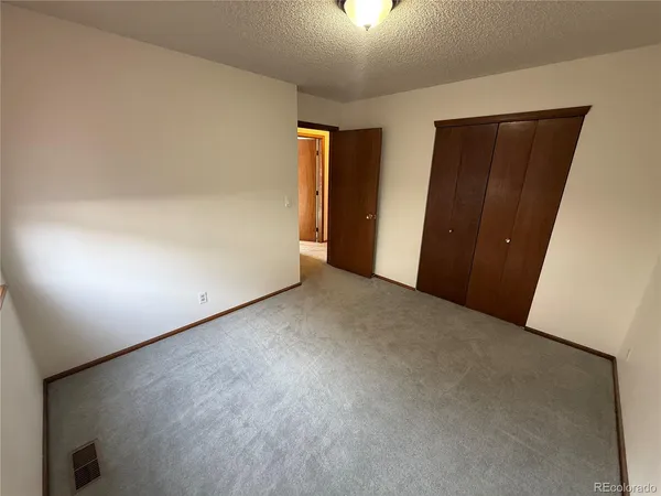 an empty room with window