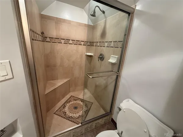 a view of a room with windows