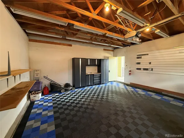 a view of empty room with window and fireplace