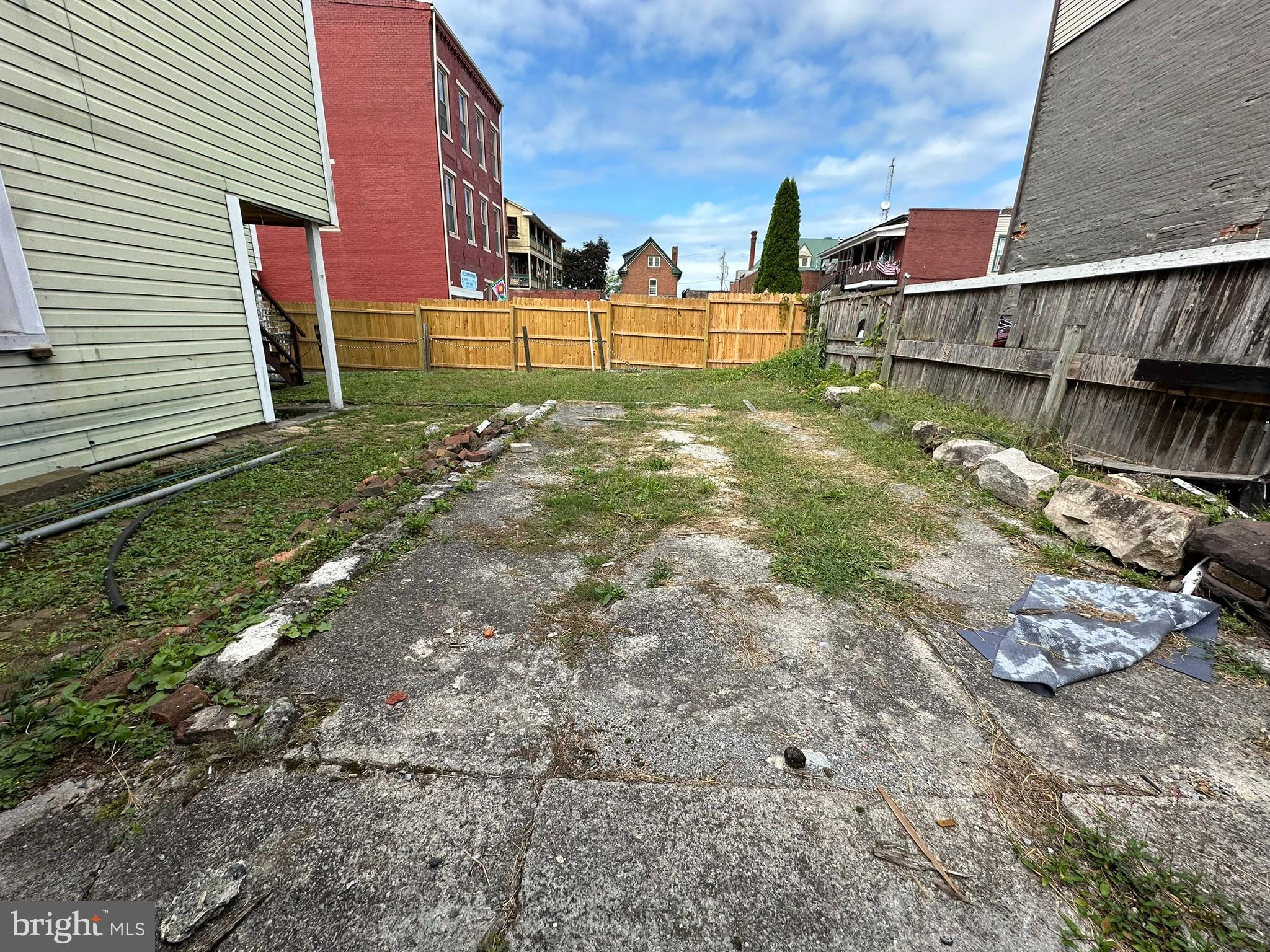 513-515 Penn Street Huntingdon, PA 16652 - Photo 2 of 23 a view of a backyard with plants
