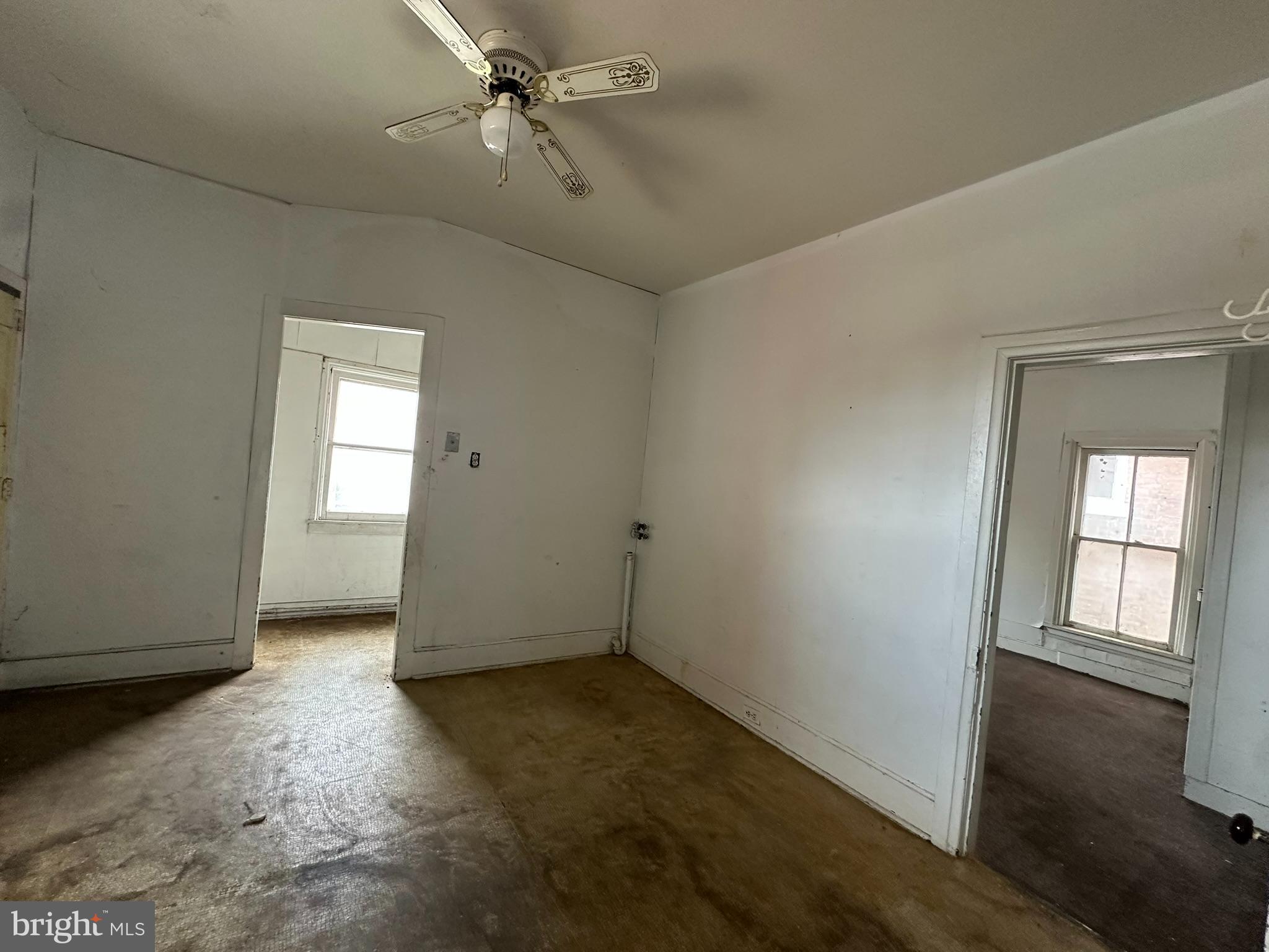 513-515 Penn Street Huntingdon, PA 16652 - Photo 21 of 23 an empty room with windows