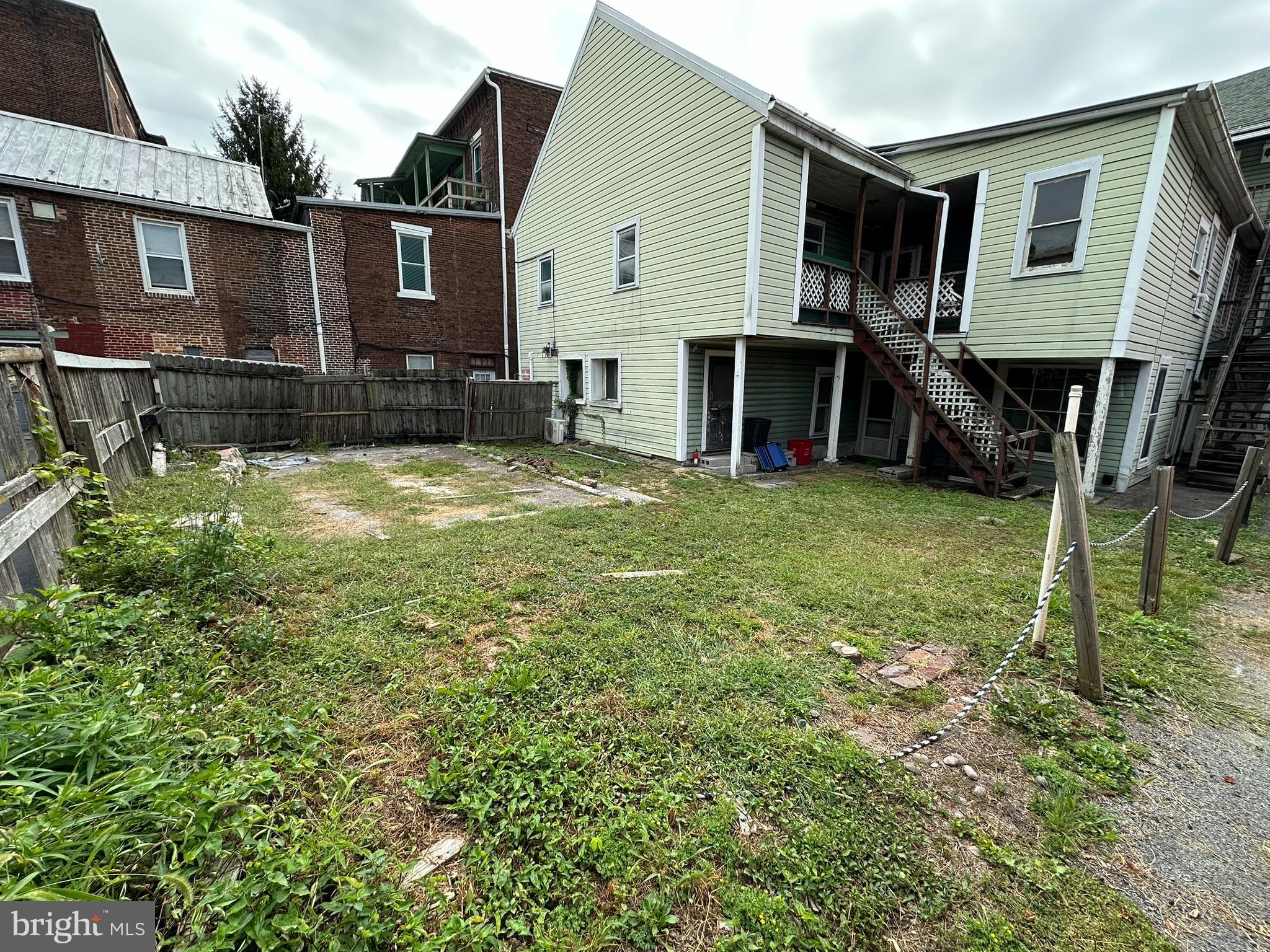 513-515 Penn Street Huntingdon, PA 16652 - Photo 23 of 23 a view of a house with backyard and sitting area