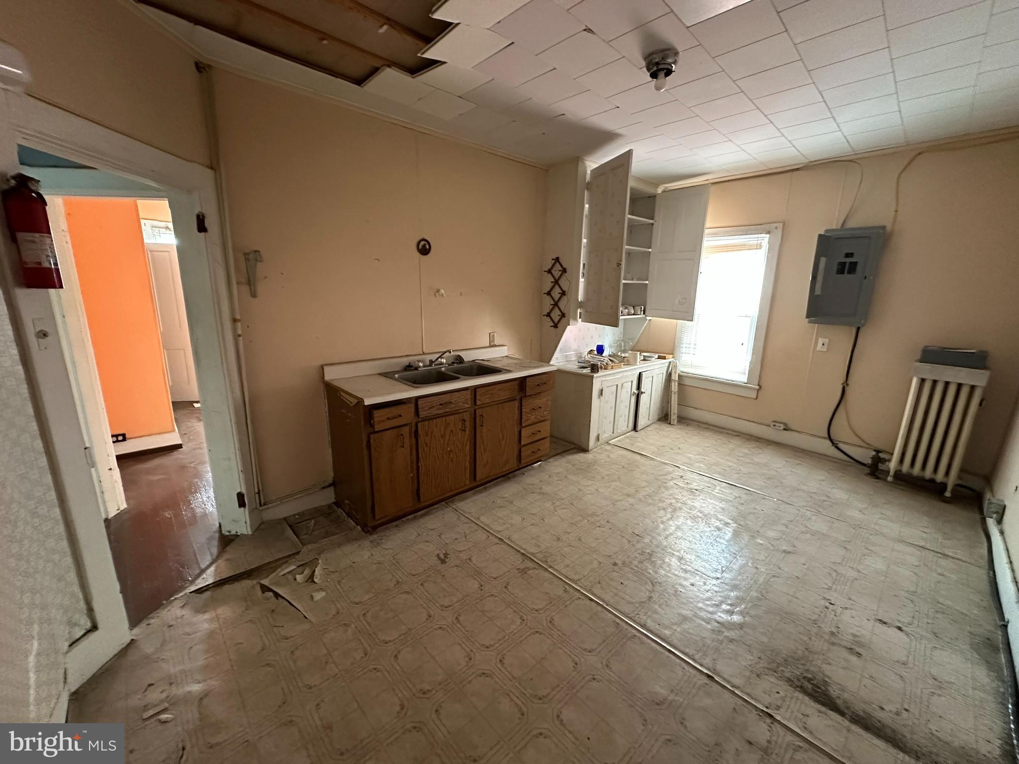 513-515 Penn Street Huntingdon, PA 16652 - Photo 3 of 23 a view of an empty room with a window