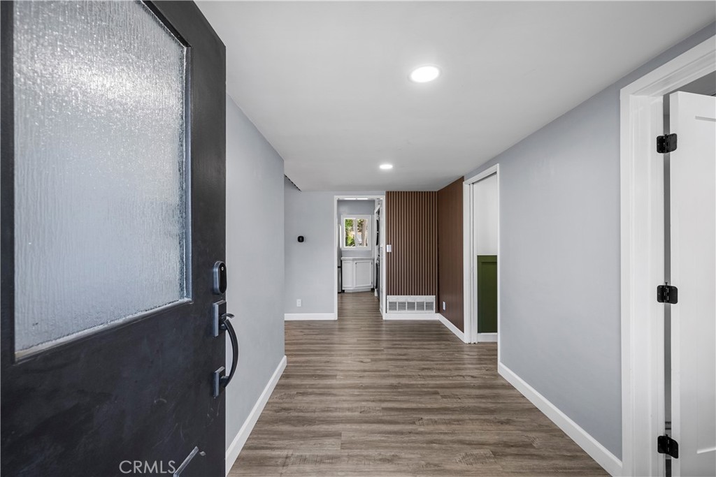 25083 Wheeler Road Newhall, CA 91321 - Photo 2 of 46 a view of a hallway with wooden floor