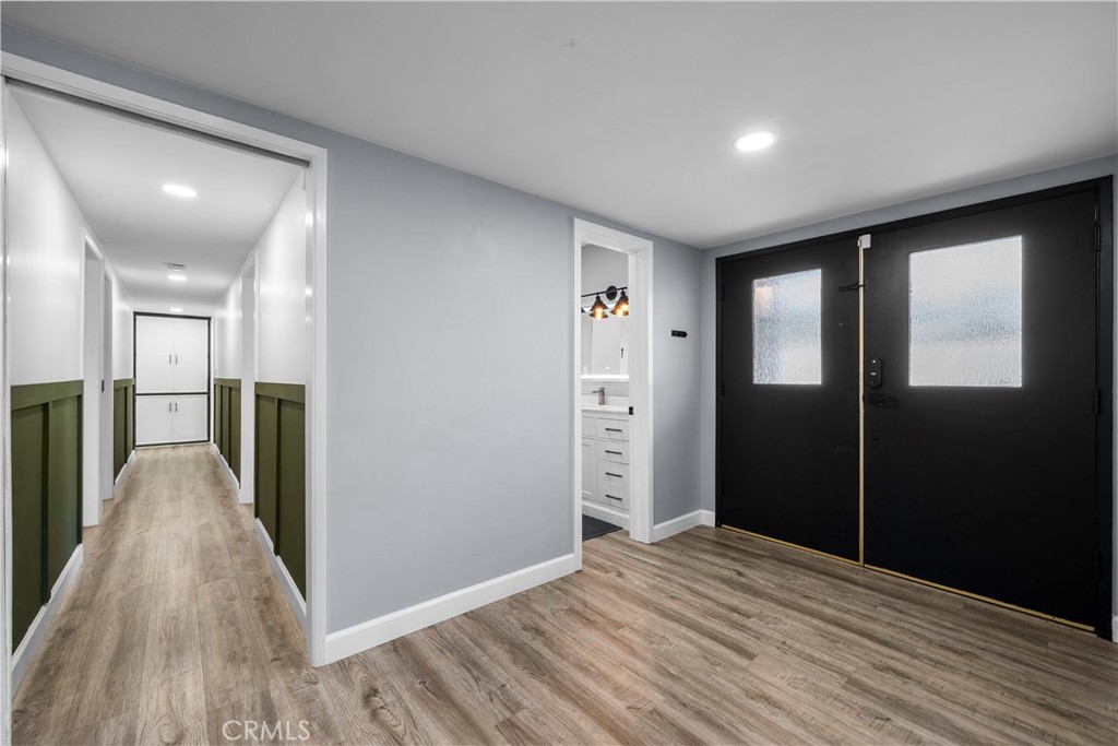 25083 Wheeler Road Newhall, CA 91321 - Photo 3 of 46 a view of hallway with wooden floor