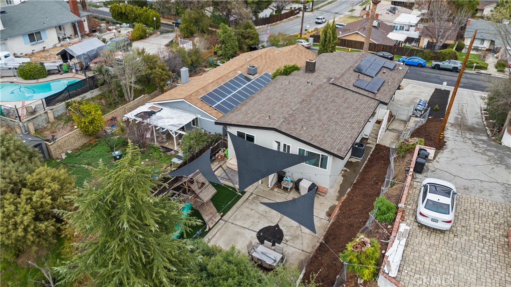 25083 Wheeler Road Newhall, CA 91321 - Photo 37 of 46 an aerial view of a house with garden space and sitting area
