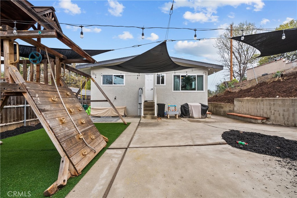 25083 Wheeler Road Newhall, CA 91321 - Photo 44 of 46 a view of a house with a yard