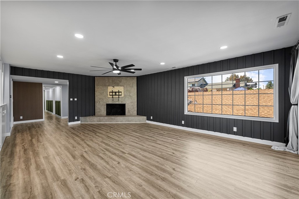 25083 Wheeler Road Newhall, CA 91321 - Photo 8 of 46 a view of an empty room with a window and fireplace