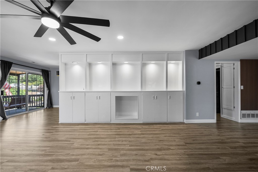 25083 Wheeler Road Newhall, CA 91321 - Photo 9 of 46 wooden floor in an empty room with a window