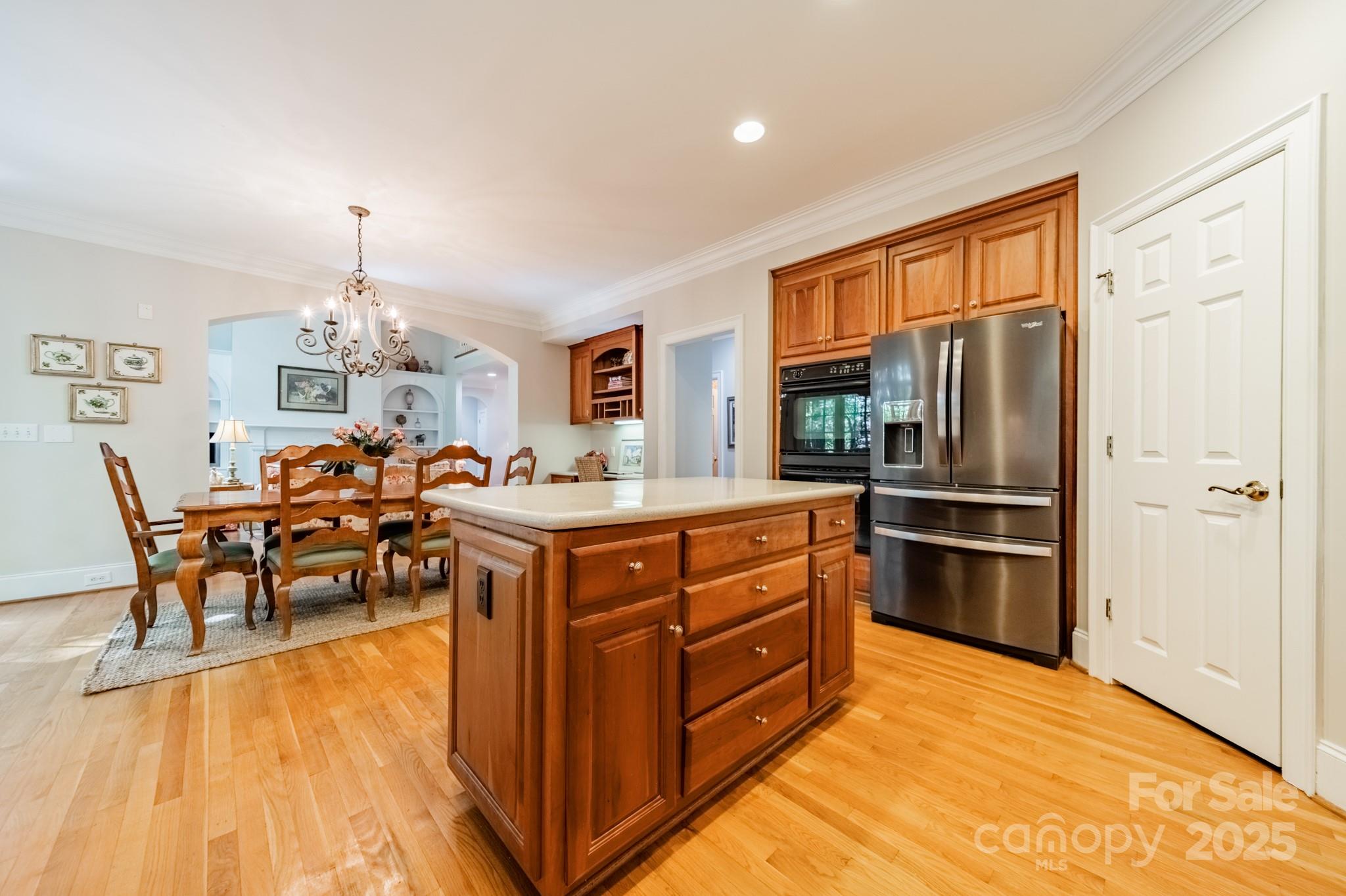 4646 Eagle Pointe Court Denver, NC 28037 - Photo 16 of 47 a kitchen with stainless steel appliances granite countertop a stove and a refrigerator