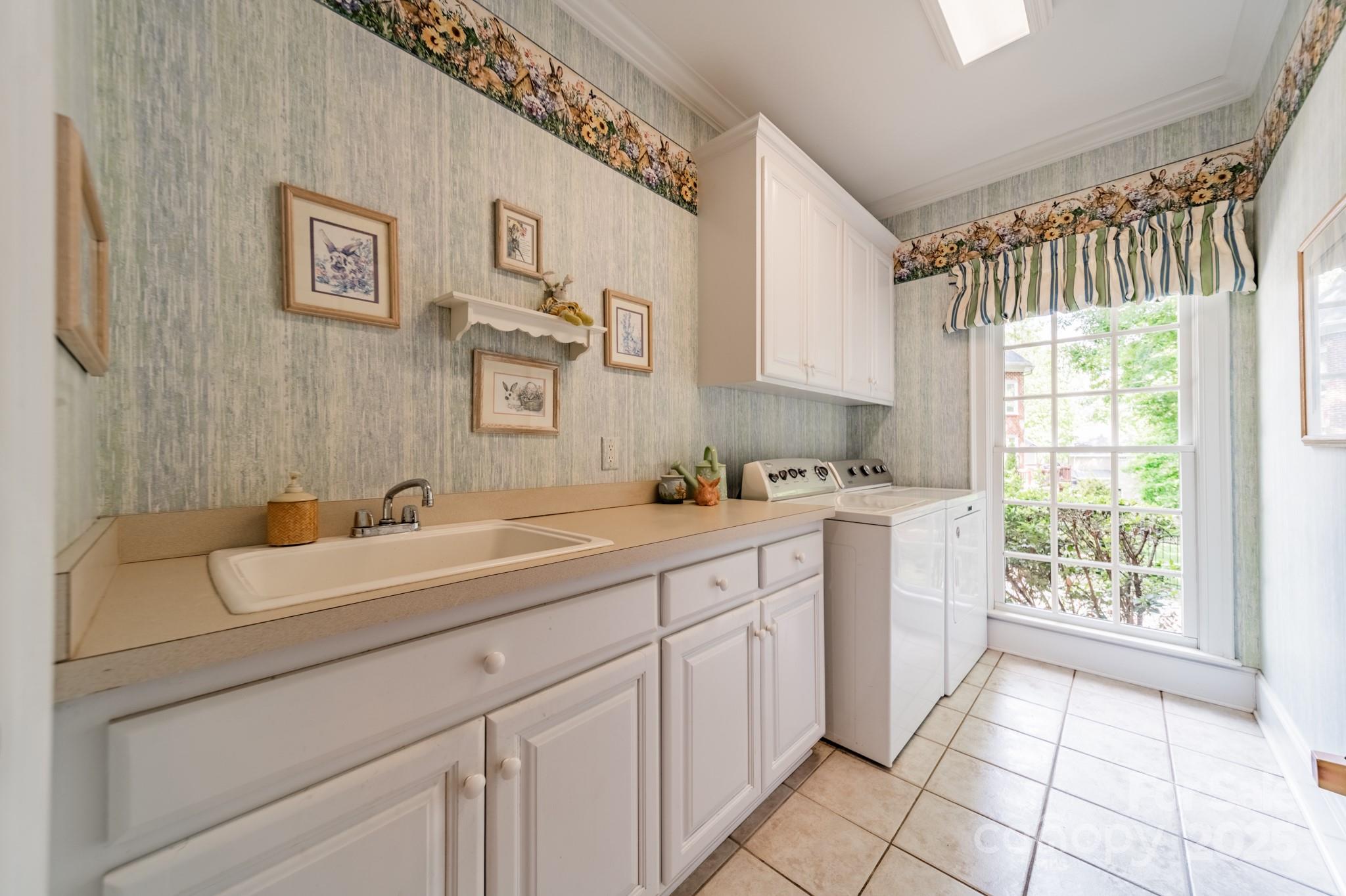 4646 Eagle Pointe Court Denver, NC 28037 - Photo 21 of 47 a spacious bathroom with a double vanity sink a mirror and next to a window