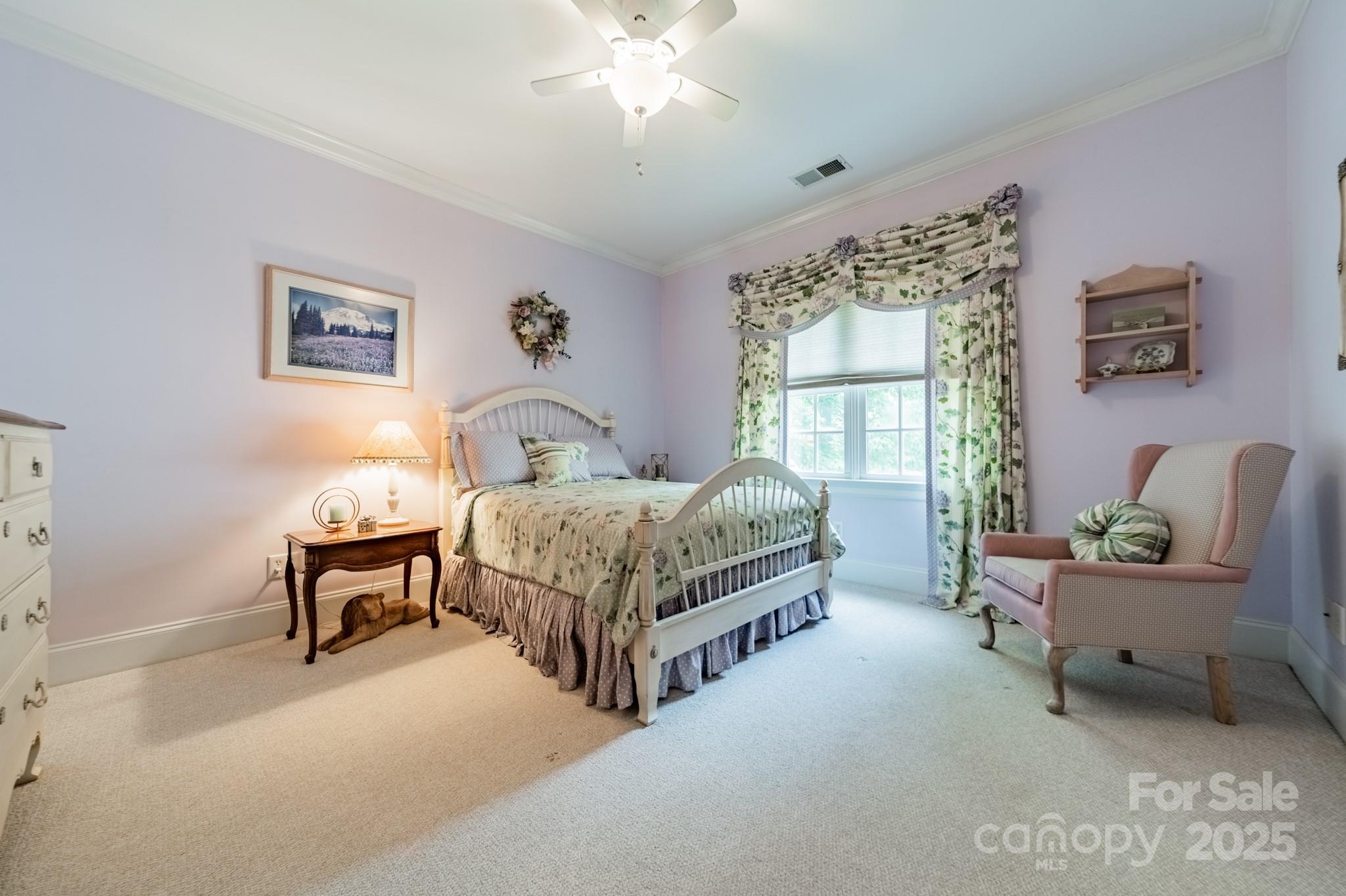 4646 Eagle Pointe Court Denver, NC 28037 - Photo 27 of 47 a bedroom with a bed chair and window