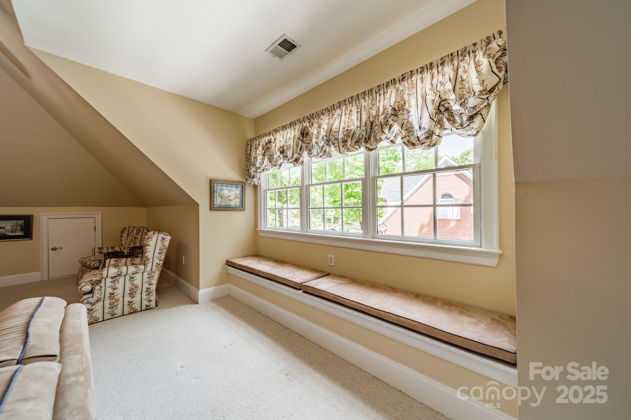 4646 Eagle Pointe Court Denver, NC 28037 - Photo 32 of 47 a living room with furniture and a large window