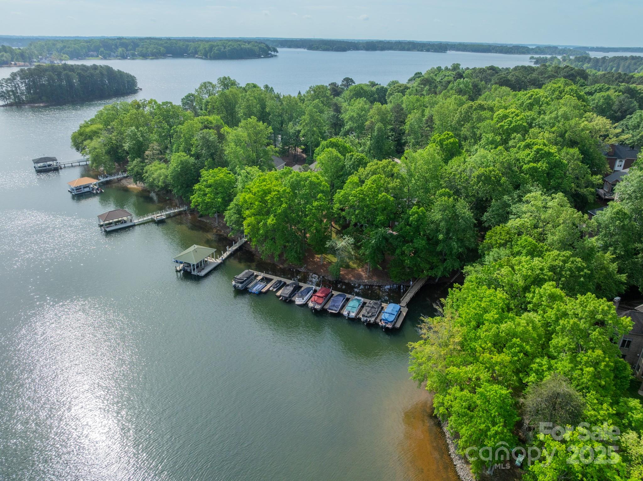 4646 Eagle Pointe Court Denver, NC 28037 - Photo 39 of 47 an aerial view of a house with a yard and lake view