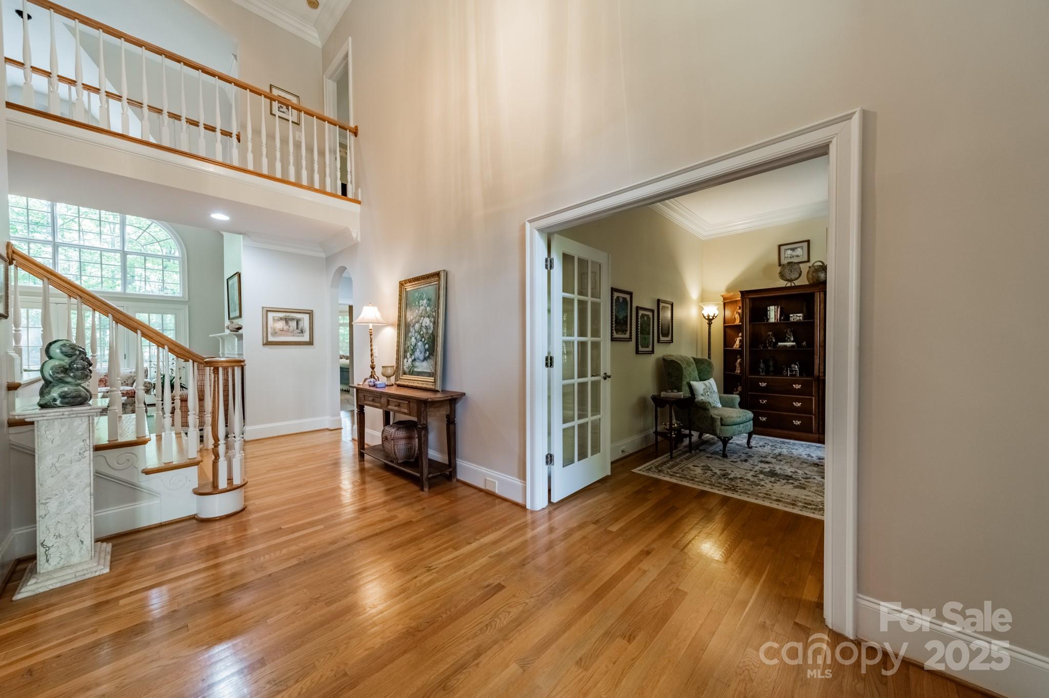 4646 Eagle Pointe Court Denver, NC 28037 - Photo 6 of 47 a view of an entryway and livingroom with furniture