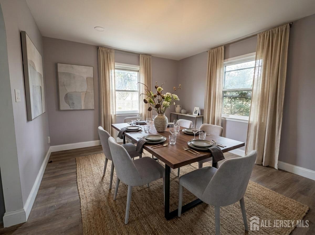 53 North Post Road West Windsor, NJ 08550 - Photo 11 of 36 a view of a dining room with furniture window and wooden floor