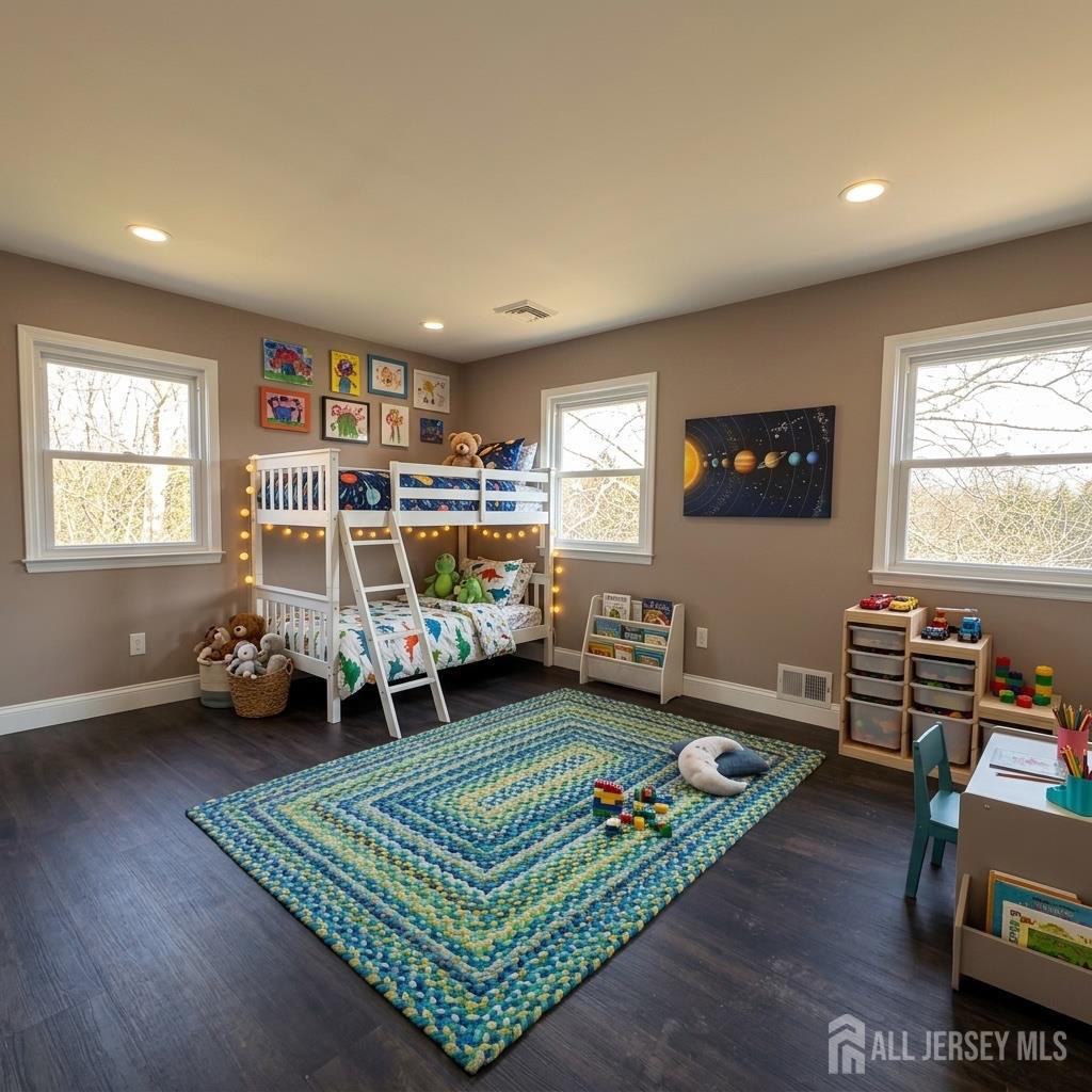 53 North Post Road West Windsor, NJ 08550 - Photo 18 of 36 a bedroom with furniture window and wooden floor