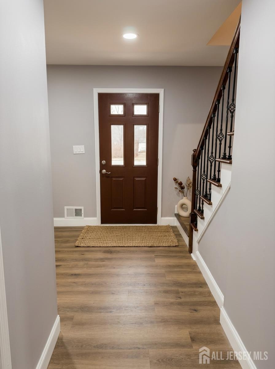 53 North Post Road West Windsor, NJ 08550 - Photo 2 of 36 a view of an entryway with wooden floor