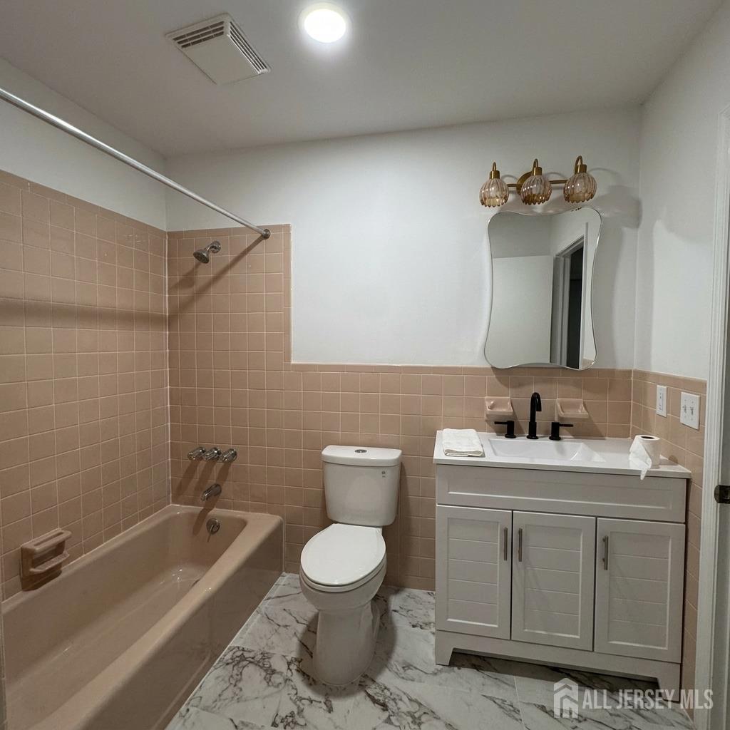 53 North Post Road West Windsor, NJ 08550 - Photo 21 of 36 a bathroom with a toilet sink and mirror
