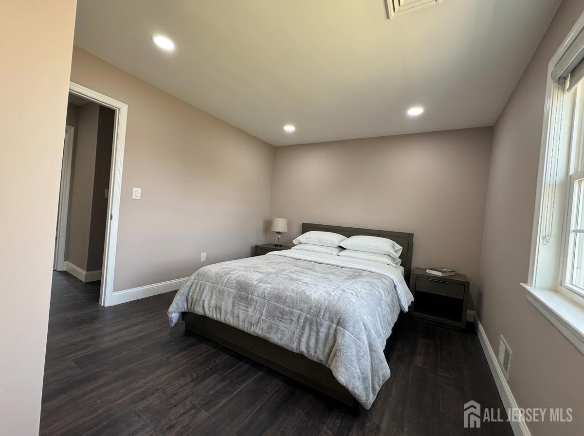 53 North Post Road West Windsor, NJ 08550 - Photo 23 of 36 a bedroom with a bed and a window