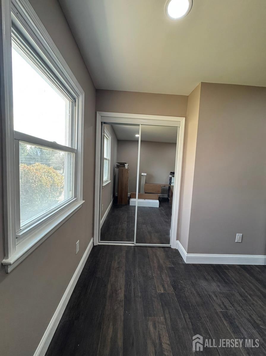 53 North Post Road West Windsor, NJ 08550 - Photo 26 of 36 a view of a room with wooden floor and a window