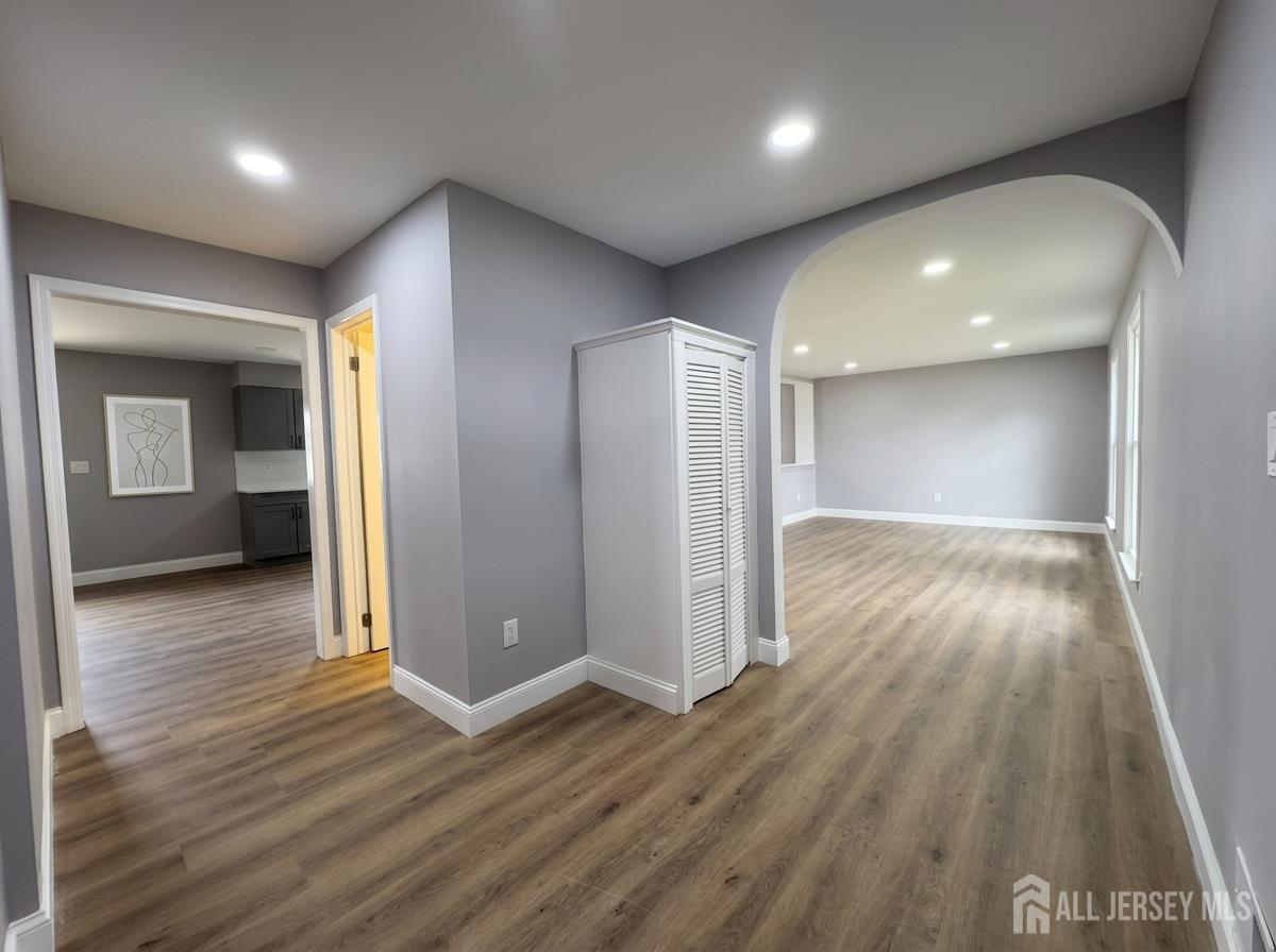 53 North Post Road West Windsor, NJ 08550 - Photo 3 of 36 a view of hallway with wooden floor